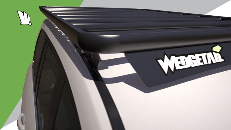 Front view of the Wedgetail roof rack installed on a Toyota LandCruiser 200 Series showing the eight cross bars installed to give the platform its super strength and the wind deflector to provide minimal wind noise.
