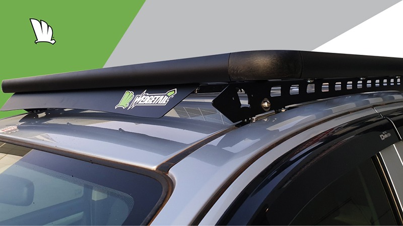 Image of front of roof with a Wedgetail rack installed showing wind deflector and one piece mounting rails.