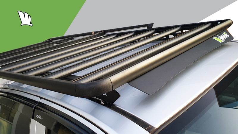 Image of front of roof with a Wedgetail rack installed showing wind deflector and one piece mounting rails.