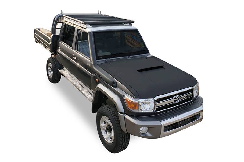 Hero image from front of a Toyota LandCruiser 79 Series dual cab with a Wedgetail roof rack installed.