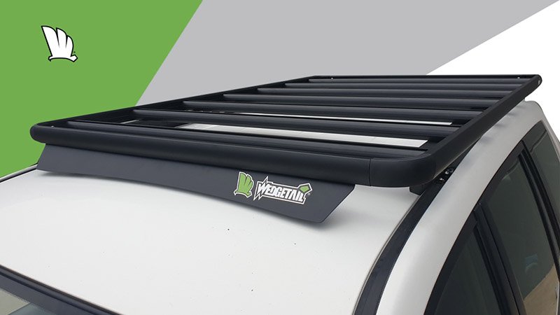 High front view of the Wedgetail rack on the Prado 120 Series showing the wind deflector, the mounting points for the one piece mounting rails and the platform on top with seven cross bars to give superior strength.