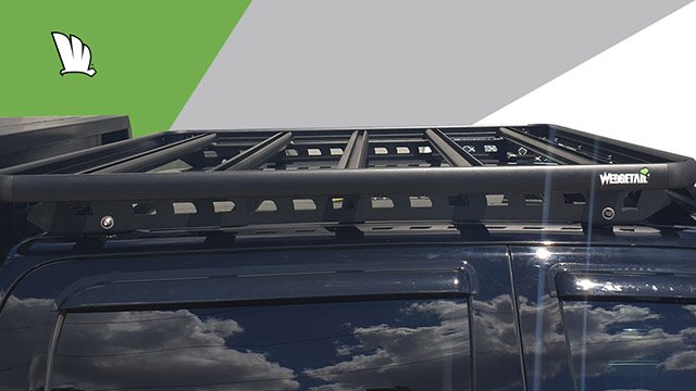 Side view of Chevrolet Silverado 1500 with a Wedgetail roof rack installed on the cabin roof showing the mounting rails and the strong cross bars and frame of the roof rack platform.